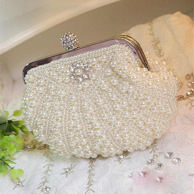 حقيبة يد فاخرة من اللؤلؤ صدفي  - مراجعة Luxury Bags Direct وسعره