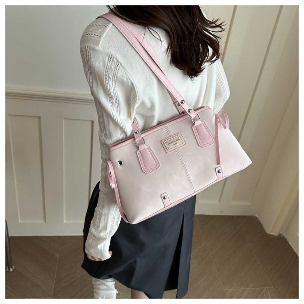 حقيبة يد مينيماليستية من الجلد - مراجعة Structured Handbag Top Handle وسعره